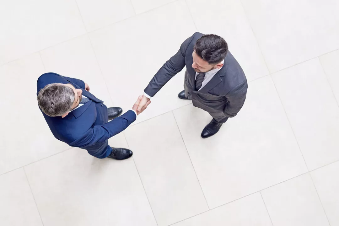 Handschlag zwischen zwei Unternehmern